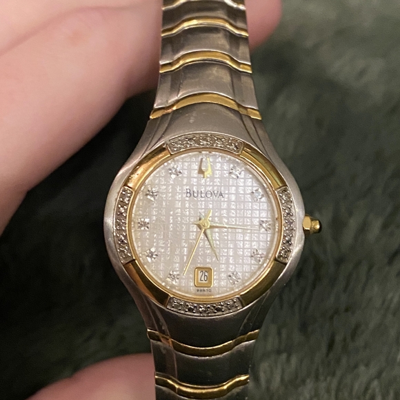 Bulova Women's Gold and Silver Watch - Picture 1 of 3